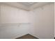 Walk-in closet featuring white walls, carpeted flooring, and wire shelving at 9655 Lame Horse Dr, Las Vegas, NV 89123