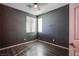 Bedroom with sleek laminate flooring and neutral wall color, creating a versatile canvas for personalization at 9831 Running Rabbit St, Las Vegas, NV 89143