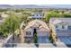 Charming single-story home featuring a tile roof and well-manicured landscaping in a quiet neighborhood at 9831 Running Rabbit St, Las Vegas, NV 89143