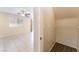 Bright bedroom with neutral walls, ceiling fan, tile flooring, and natural light through a window at 10457 Armand Ave, Las Vegas, NV 89129