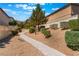 Inviting community path with lush landscaping, offering a serene environment for residents at 10457 Armand Ave, Las Vegas, NV 89129