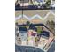 Aerial view of a well-maintained property with a private backyard and solar panels on the roof at 10650 Robin Hill Ave at 10650 Robin Hill Ave, Las Vegas, NV 89129