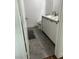 Cozy bathroom with modern vanity, sink and toilet at 10650 Robin Hill Ave, Las Vegas, NV 89129