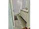 Neutral half bath offering modern fixtures and tile flooring at 10650 Robin Hill Ave, Las Vegas, NV 89129
