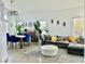 Open living space with dining area, comfortable seating, and ample natural light at 10650 Robin Hill Ave, Las Vegas, NV 89129