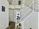 Elegant staircase leading to the upper level, with modern fixtures and bright lighting at 10650 Robin Hill Ave, Las Vegas, NV 89129