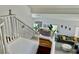 Open-concept staircase showcasing the architecture and design of the home's entry and living space at 10650 Robin Hill Ave, Las Vegas, NV 89129