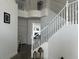 Well-lit staircase featuring modern design, complemented by an open and airy landing at 10650 Robin Hill Ave, Las Vegas, NV 89129