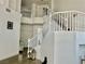 Open-concept staircase showcasing the architecture and design of the home at 10650 Robin Hill Ave, Las Vegas, NV 89129