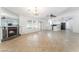Living room features a fireplace, large windows, and views to kitchen at 1108 Sidehill Way, Las Vegas, NV 89110