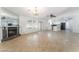 Living room features a fireplace, large windows, and views to kitchen at 1108 Sidehill Way, Las Vegas, NV 89110