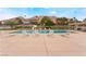 Inviting community pool with lounge chairs and mountain views at 1108 Sidehill Way, Las Vegas, NV 89110