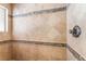 Shower features elegant tile surround with decorative mosaic border and bronze fixtures at 1108 Sidehill Way, Las Vegas, NV 89110