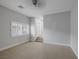 Neutral bedroom featuring carpet, a ceiling fan, and a window with shutters at 11158 Antonine Wall Ct, Las Vegas, NV 89141