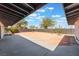 Backyard featuring gravel, desert landscaping, concrete patio, and block wall at 1202 Arrowhead Ave, Las Vegas, NV 89106