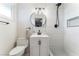Beautiful bathroom featuring new sink, modern fixtures, and white tiling at 1202 Arrowhead Ave, Las Vegas, NV 89106