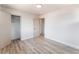 Spacious bedroom with a closet, new flooring, and neutral paint at 1202 Arrowhead Ave, Las Vegas, NV 89106
