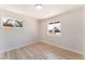 Bright bedroom features new floors and natural light from two windows at 1202 Arrowhead Ave, Las Vegas, NV 89106
