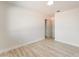 Open bedroom with white walls, new flooring, and neutral decor at 1202 Arrowhead Ave, Las Vegas, NV 89106