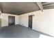 Spacious carport area featuring concrete flooring and ample space for vehicles or storage at 1202 Arrowhead Ave, Las Vegas, NV 89106