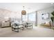 This main bedroom boasts lots of space, neutral colors, and a beautiful accent wall for a relaxing atmosphere at 1212 Crimson Sunbird St, North Las Vegas, NV 89084
