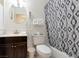 A bathroom with a shower-tub combo and stylish fixtures at 1553 Dorothy Ave # 4, Las Vegas, NV 89119