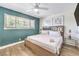 Bright bedroom with a large window, king bed and stylish decor at 1553 Dorothy Ave # 4, Las Vegas, NV 89119