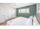 Bright bedroom featuring a king bed, TV, and ceiling fan at 1553 Dorothy Ave # 4, Las Vegas, NV 89119