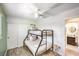 A bedroom featuring a bunk bed and ceiling fan at 1553 Dorothy Ave # 4, Las Vegas, NV 89119