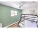 A bedroom featuring a bunk bed and ceiling fan at 1553 Dorothy Ave # 4, Las Vegas, NV 89119