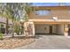 Inviting two-story townhouse with a private covered parking area and a small storage room entrance at 1553 Dorothy Ave # 4, Las Vegas, NV 89119