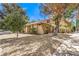 Property exterior highlighting a landscaped yard and a gravel area at 1553 Dorothy Ave # 4, Las Vegas, NV 89119