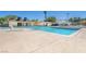 Sparkling community pool with lounge chairs, perfect for relaxation and recreation at 1553 Dorothy Ave # 4, Las Vegas, NV 89119
