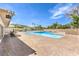 Community swimming pool with a brick deck and lounge chairs; a great place to relax and socialize at 1553 Dorothy Ave # 4, Las Vegas, NV 89119
