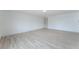 Bedroom featuring new luxury vinyl plank flooring and neutral paint color at 1808 E Saint Louis Ave, Las Vegas, NV 89104