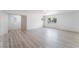 Spacious bedroom with luxury vinyl plank flooring, natural light, and large closet at 1808 E Saint Louis Ave, Las Vegas, NV 89104