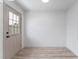 Entryway featuring new luxury vinyl plank flooring and neutral paint color at 1808 E Saint Louis Ave, Las Vegas, NV 89104