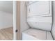 White stacked washer and dryer in laundry area at 1808 E Saint Louis Ave, Las Vegas, NV 89104