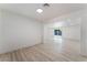 Bright living room with light wood floors and access to the outdoor pool area through sliding glass doors at 1808 E Saint Louis Ave, Las Vegas, NV 89104