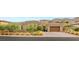 Attractive single story home with a tile roof, manicured landscaping, and a two-car garage, showcasing curb appeal at 21 Grand Masters Dr, Las Vegas, NV 89141