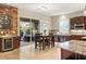 Bright kitchen featuring a dining table, and outdoor view at 21 Grand Masters Dr, Las Vegas, NV 89141