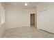 Bright bedroom features neutral walls, window shutters, ceiling fan, and a double door closet at 2163 Bannerwood St, Henderson, NV 89044