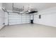 Spacious two-car garage with epoxy floors and overhead racks for extra storage at 2163 Bannerwood St, Henderson, NV 89044