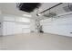Spacious two-car garage with epoxy floors and cabinetry for extra storage at 2163 Bannerwood St, Henderson, NV 89044