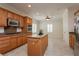 Modern kitchen featuring granite countertops, an island, stainless steel appliances, and recessed lighting at 2163 Bannerwood St, Henderson, NV 89044