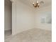 Room showcases neutral walls, beautiful window shutters, and elegant lighting fixture at 2163 Bannerwood St, Henderson, NV 89044