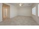 A room featuring neutral walls, beautiful window shutters, and a ceiling fan at 2163 Bannerwood St, Henderson, NV 89044