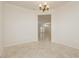 An interior shot showcases neutral walls, elegant lighting fixture, and doorway at 2163 Bannerwood St, Henderson, NV 89044