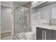 Modern bathroom with glass-enclosed shower and sleek vanity at 2212 Warm Walnut Dr, Las Vegas, NV 89134