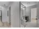 Ensuite bathroom with glass-enclosed shower and nearby doorway at 2212 Warm Walnut Dr, Las Vegas, NV 89134